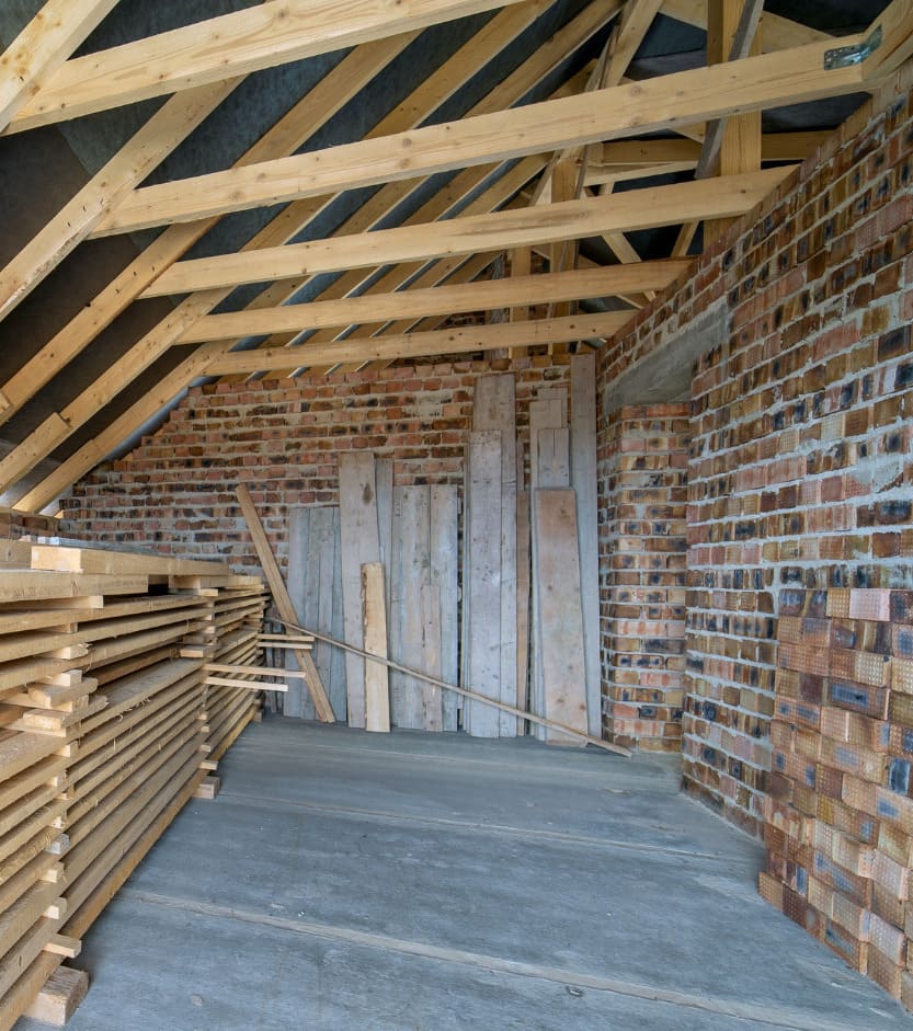 Rénovation de la charpente de toiture d'un dessous-de-toit pour faire une pièce supplémentaire